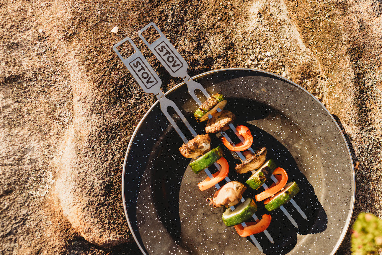 Onions, zucchini, mushrooms, peppers cooking and ready to be eaten on the STOV skewers.